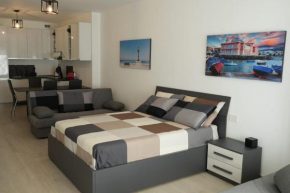HomeGA - City Center New Apartment